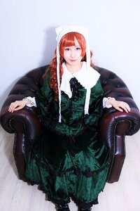 Rating: Safe Score: 0 Tags: 1girl bangs boots braid chair dress frills gothic_lolita green_dress lips lolita_fashion long_hair long_sleeves looking_at_viewer pantyhose red_hair sitting solo suiseiseki twin_braids User: admin