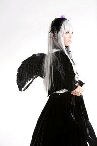 Rating: Safe Score: 0 Tags: 1girl angel_wings bangs black_dress black_wings closed_mouth dress feathered_wings feathers hairband long_hair long_sleeves looking_at_viewer simple_background solo suigintou white_background white_wings wings User: admin
