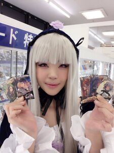 Rating: Safe Score: 0 Tags: 1girl bangs flower hairband long_hair looking_at_viewer realistic smile solo suigintou User: admin