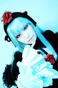 Rating: Safe Score: 0 Tags: 1girl blue_background cup flower frills gothic_lolita lips long_hair looking_at_viewer red_eyes red_rose rose simple_background solo suigintou User: admin