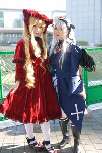 Rating: Safe Score: 0 Tags: 2girls black_footwear blonde_hair blurry bonnet boots chain-link_fence depth_of_field dress fence frills long_hair long_sleeves looking_at_viewer multiple_cosplay multiple_girls pavement shinku silver_hair standing tagme tile_floor tiles white_legwear User: admin