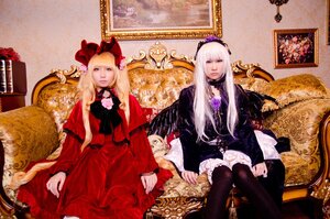 Rating: Safe Score: 0 Tags: 2girls blonde_hair blue_eyes bow dress flower lips long_hair multiple_cosplay multiple_girls red_dress shinku sitting tagme white_hair User: admin