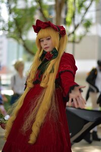 Rating: Safe Score: 0 Tags: 1girl bangs blonde_hair blurry blurry_background blurry_foreground bonnet depth_of_field dress flower lips long_hair long_sleeves looking_at_viewer outdoors photo pink_rose red_dress red_flower red_rose rose shinku solo solo_focus standing User: admin
