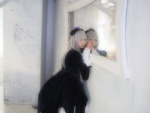 Rating: Safe Score: 0 Tags: 2girls black_dress dress frills gothic_lolita hairband long_hair long_sleeves looking_at_viewer multiple_girls silver_hair solo suigintou User: admin