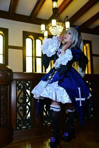 Rating: Safe Score: 0 Tags: 1girl boots dress flower frills indoors lips long_hair rose solo suigintou User: admin