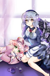 Rating: Safe Score: 0 Tags: 2girls blush dress frills gothic_lolita green_eyes hairband hinaichigo image lolita_fashion long_hair lying multiple_girls pair pink_hair short_hair suigintou wings User: admin