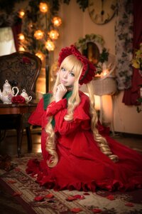 Rating: Safe Score: 0 Tags: 1girl blonde_hair blue_eyes blurry bonnet dress drill_hair flower frills indoors long_hair looking_at_viewer red_dress rose shinku sitting solo very_long_hair User: admin