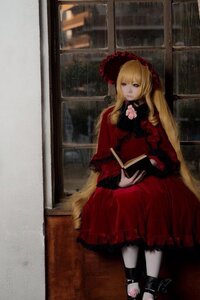 Rating: Safe Score: 0 Tags: 1girl blonde_hair blue_eyes book bow capelet dress expressionless flower holding holding_book long_hair open_book red_dress rose shinku sitting solo User: admin