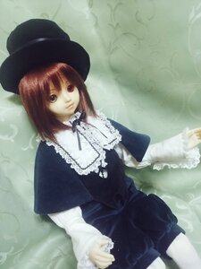 Rating: Safe Score: 0 Tags: 1girl bangs brown_hair capelet collar doll dress expressionless frills hat heterochromia long_sleeves looking_at_viewer pantyhose red_eyes short_hair sitting solo souseiseki water User: admin