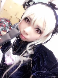 Rating: Safe Score: 0 Tags: 1girl bangs black_ribbon closed_mouth lips looking_at_viewer photo red_eyes ribbon solo suigintou white_hair User: admin