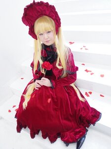 Rating: Safe Score: 0 Tags: 1girl blonde_hair blue_eyes bonnet dress flower lips long_hair looking_at_viewer petals red_dress rose shinku solo striped striped_background User: admin