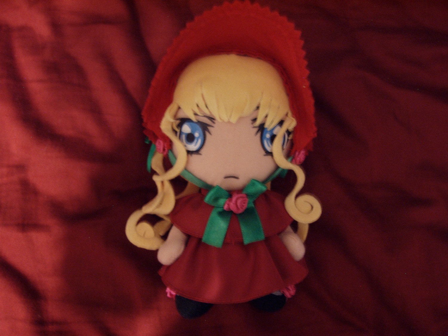 1girl blonde_hair blue_eyes bonnet bow bowtie capelet chibi doll dress flower full_body green_bow long_hair looking_at_viewer pantyhose red_capelet red_dress rose shinku sidelocks solo