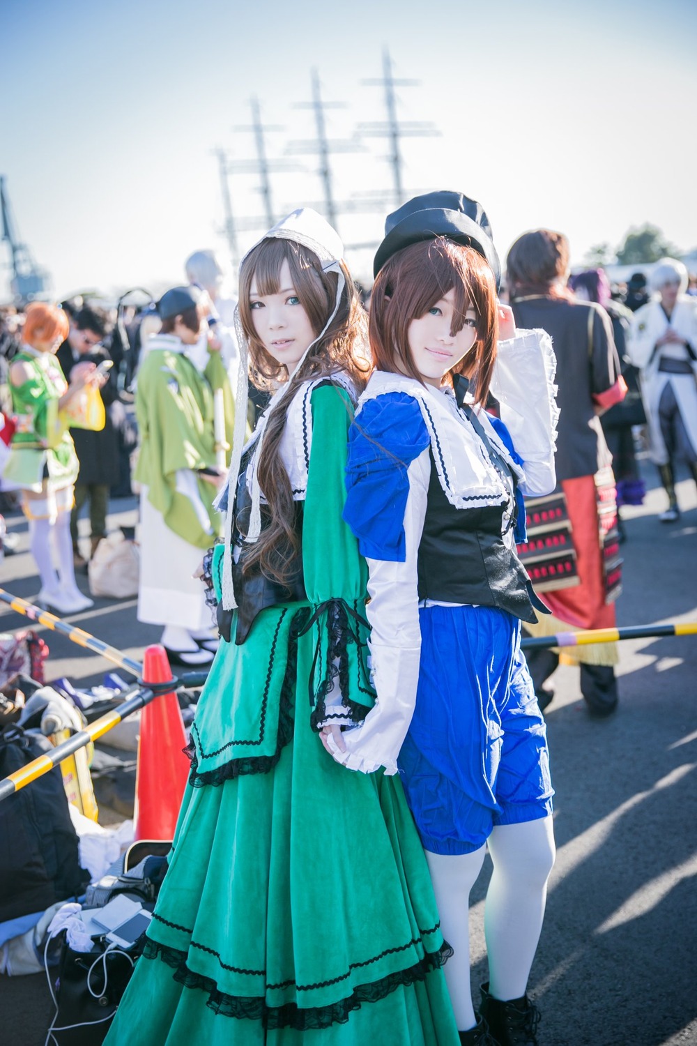 bangs black_hair blue_eyes blurry blurry_background brown_hair depth_of_field hat jacket long_hair looking_at_viewer multiple_boys multiple_cosplay multiple_girls short_hair skirt standing tagme