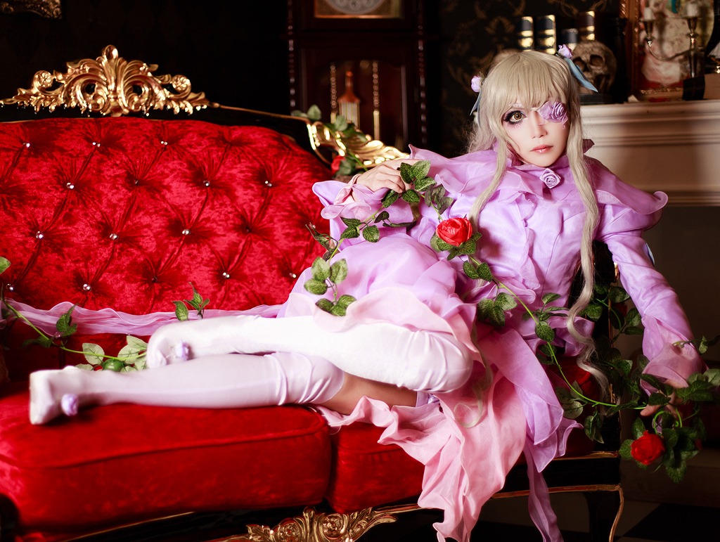 1girl barasuishou blonde_hair couch dress eyepatch flower lips long_hair pink_flower plant red_flower red_rose rose sitting solo thighhighs