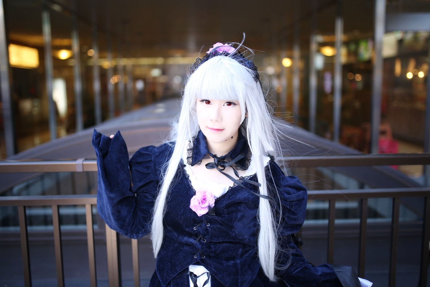 1girl 3d blurry blurry_background depth_of_field dress indoors long_hair long_sleeves photo red_eyes solo suigintou upper_body white_hair