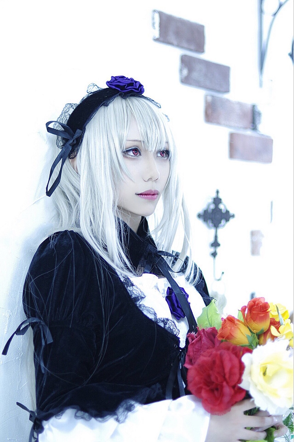 1girl blurry depth_of_field dress flower frills hairband lips long_hair pale_skin ribbon rose solo suigintou upper_body