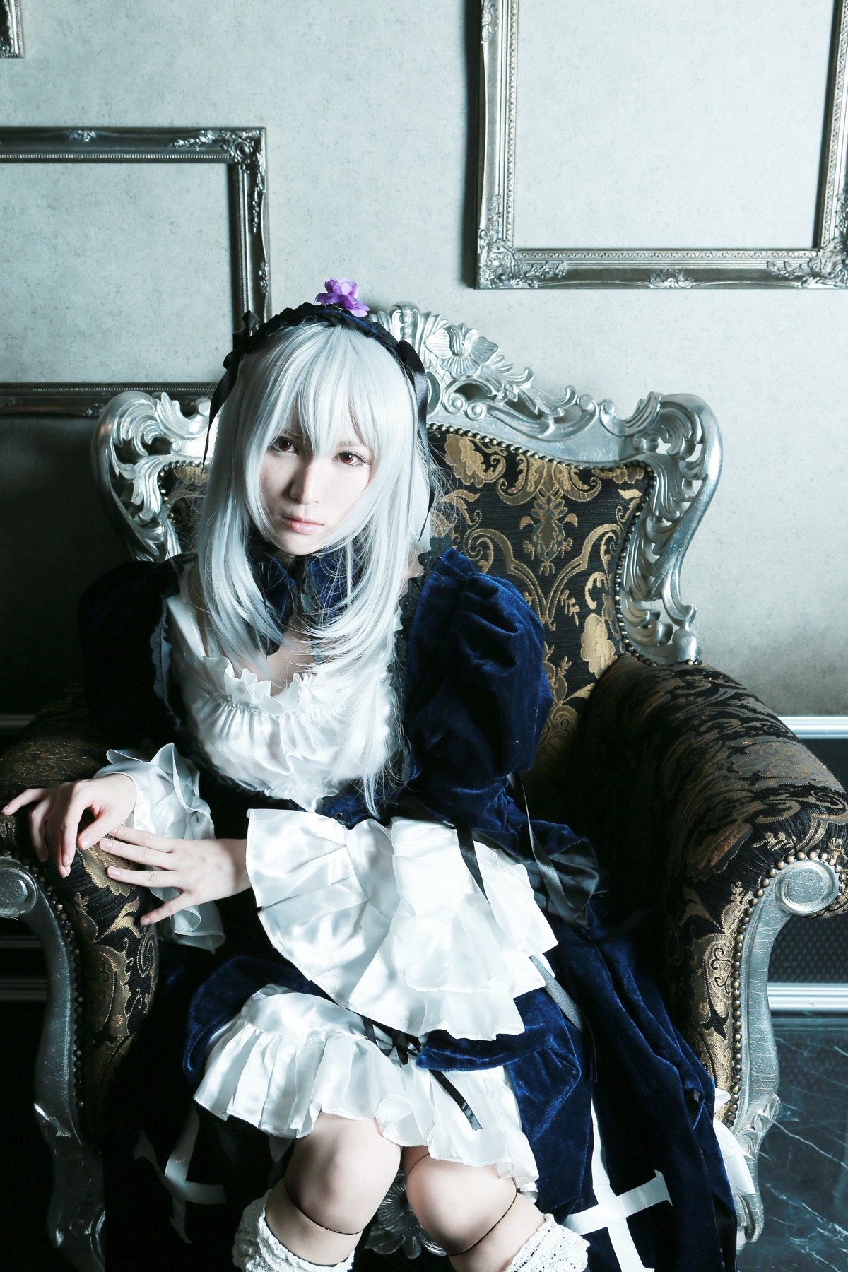 1girl chair couch dress frills gothic_lolita long_hair long_sleeves sitting solo suigintou
