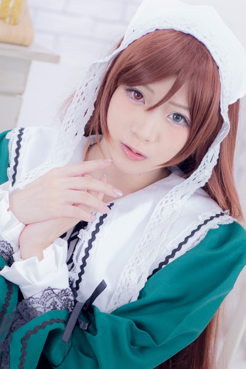 1girl blurry brown_hair depth_of_field frills heterochromia lace lips long_hair long_sleeves looking_at_viewer nail_polish solo suiseiseki