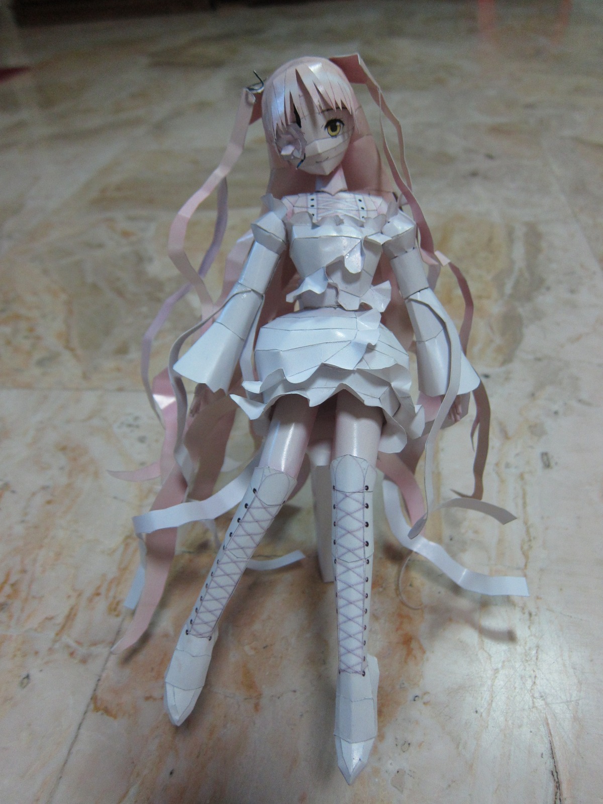 1girl bandage_over_one_eye bandages doll dress frills full_body kaname_madoka kirakishou long_hair pink_hair sitting solo yellow_eyes