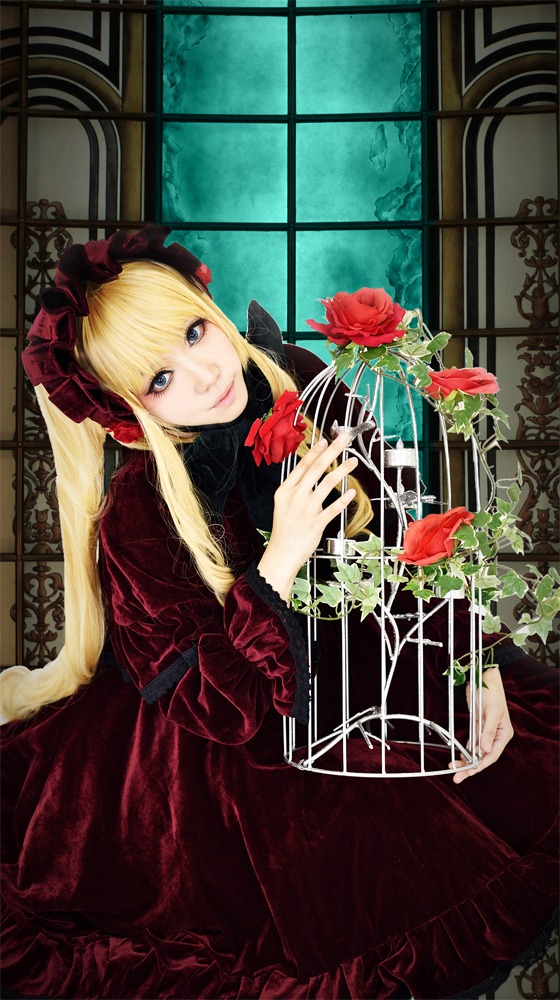 1girl blonde_hair blue_eyes bonnet dress flower long_hair looking_at_viewer red_dress red_flower red_rose rose shinku sitting solo window