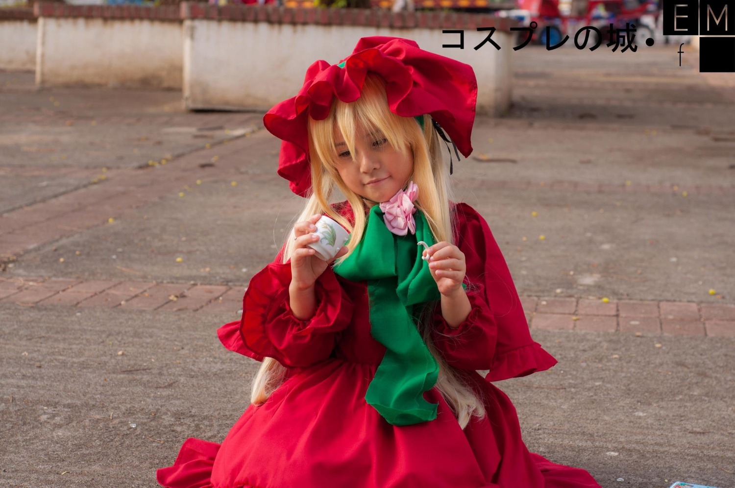 1girl blonde_hair closed_eyes dress flandre_scarlet flower hat long_sleeves mob_cap outdoors red_dress shinku solo