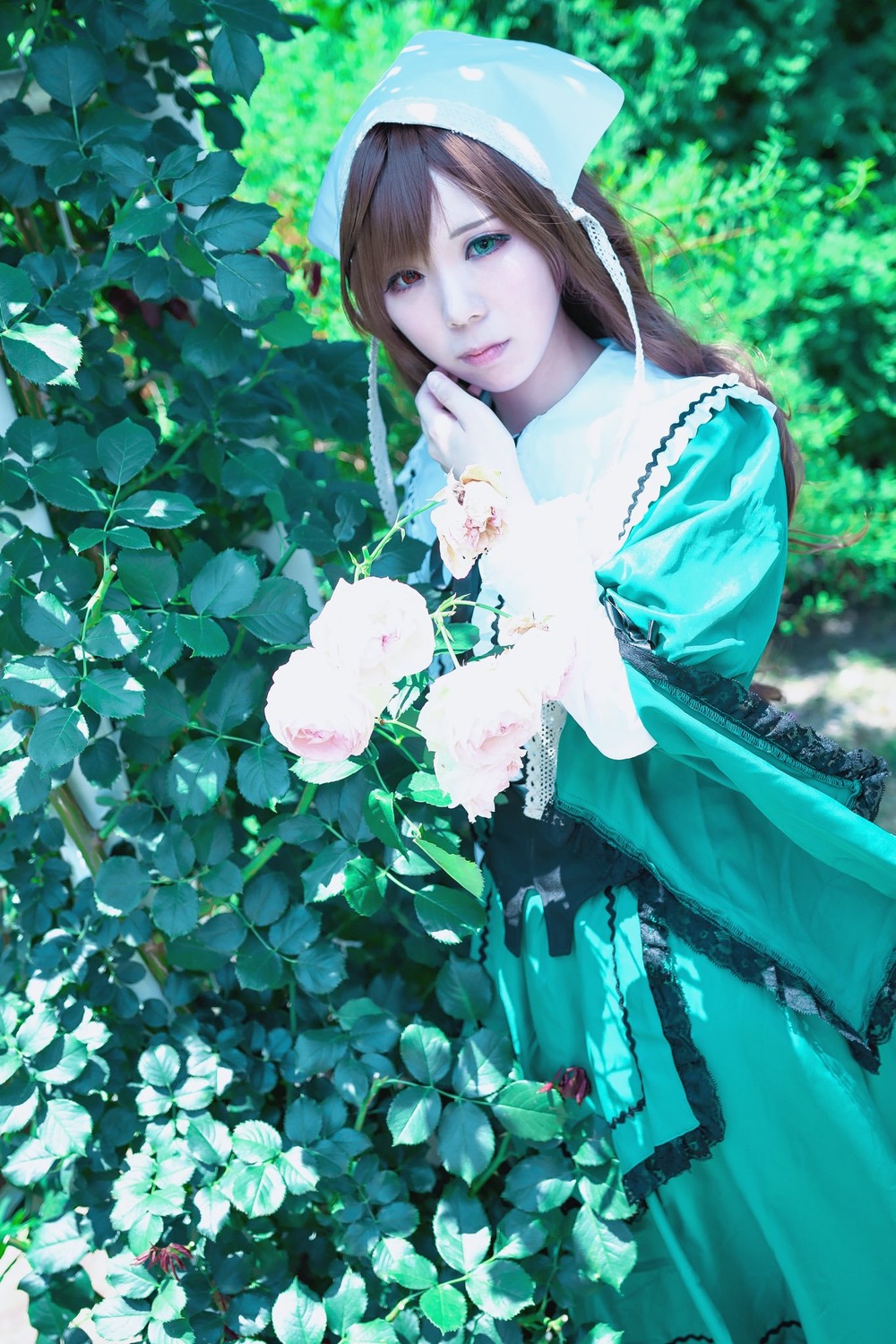 1girl blue_dress brown_hair dress flower green_dress green_eyes lips long_hair long_sleeves looking_at_viewer outdoors solo suiseiseki