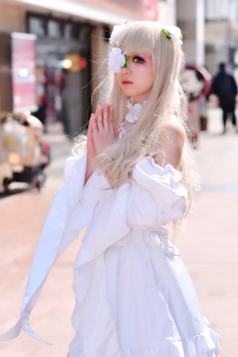 1girl blurry blurry_background blurry_foreground depth_of_field dress lips long_hair looking_at_viewer motion_blur photo solo_focus standing striped vertical_stripes white_hair