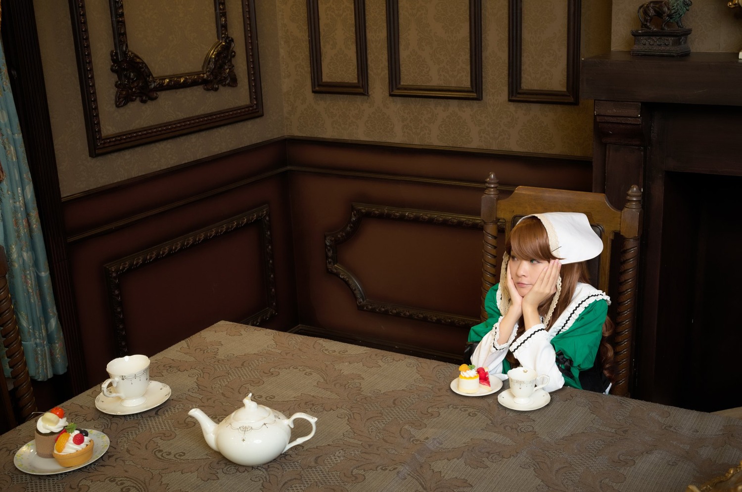 1girl brown_hair cup flower food indoors pillow saucer sitting solo spoon suiseiseki table tea teacup teapot
