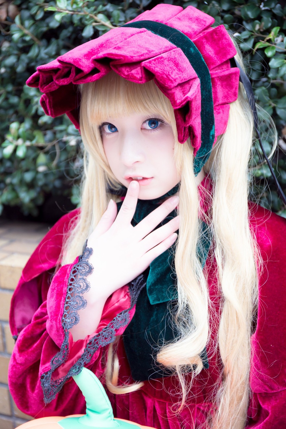 1girl bangs blonde_hair blue_eyes blurry blurry_background bonnet depth_of_field dress lolita_fashion long_hair looking_at_viewer outdoors shinku solo upper_body