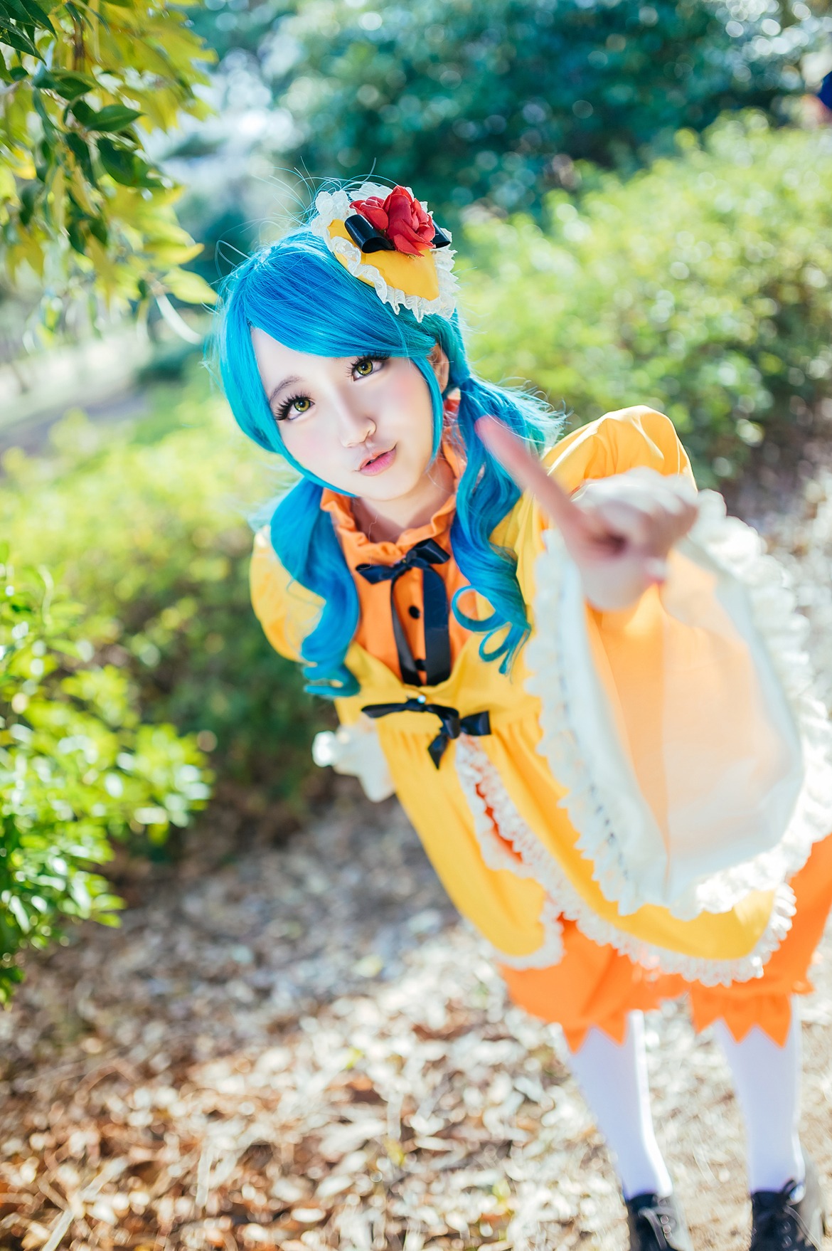 1girl blue_hair blurry day depth_of_field dress flower hair_flower hair_ornament jewelry kanaria lips looking_at_viewer outdoors photo solo