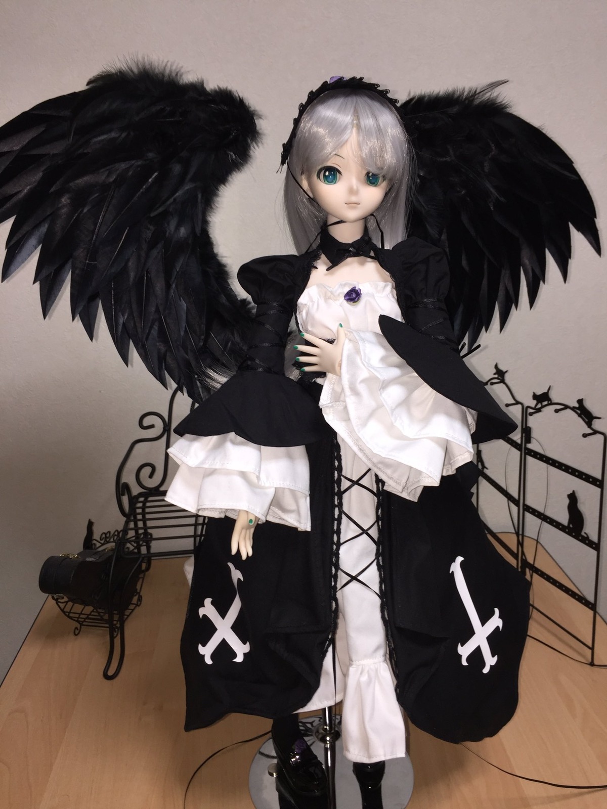 1girl bangs black_wings closed_mouth doll dress hairband jewelry long_hair long_sleeves looking_at_viewer nail_polish ring solo standing suigintou wings