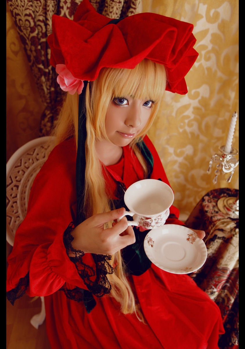 1girl black_border blonde_hair blue_eyes cup dress flower jewelry lace letterboxed lips long_hair looking_at_viewer red_dress ring shinku solo tea teacup