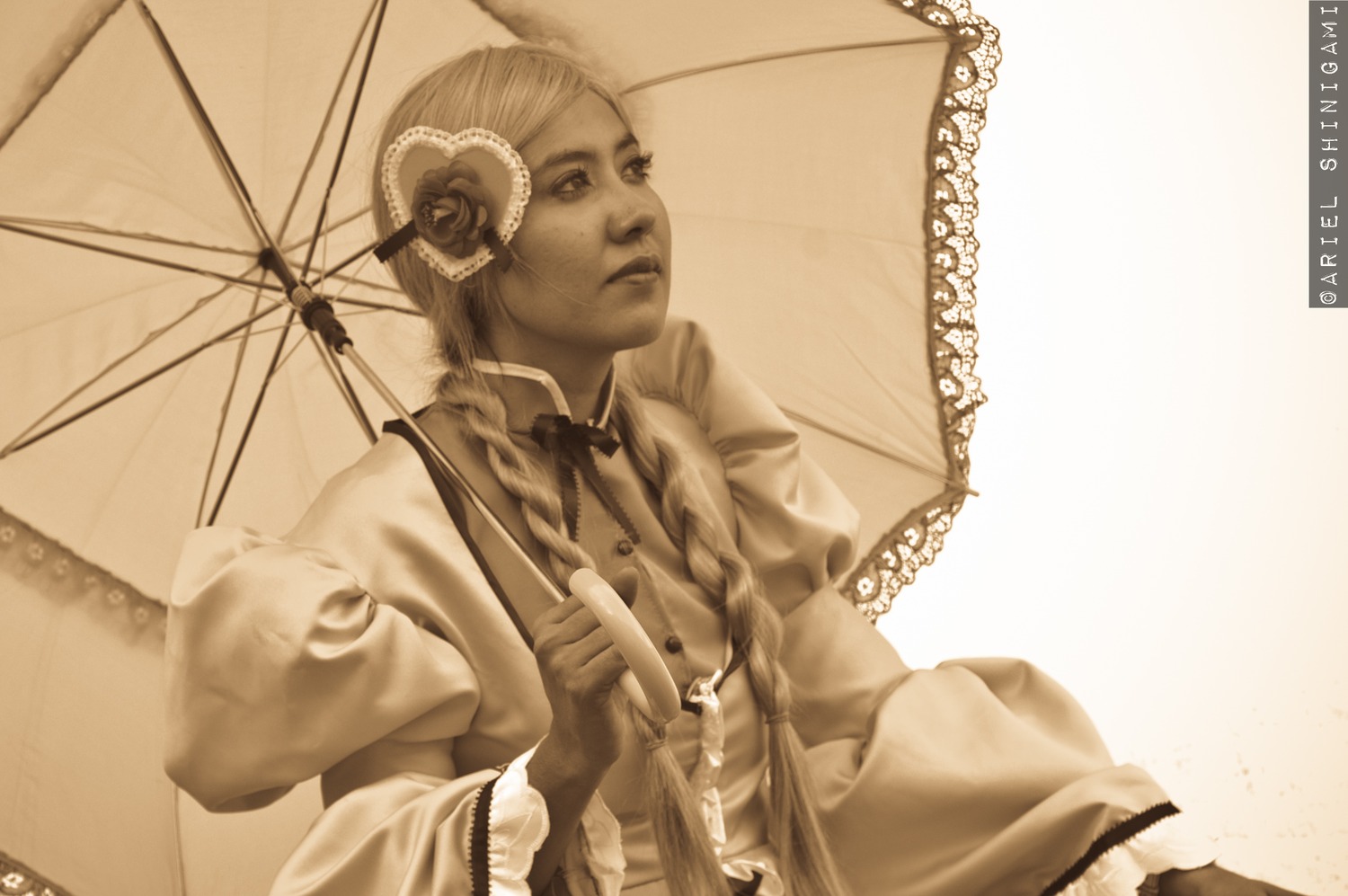 1girl auto_tagged beach_umbrella holding_umbrella kanaria lips monochrome parasol sepia shared_umbrella solo umbrella upper_body