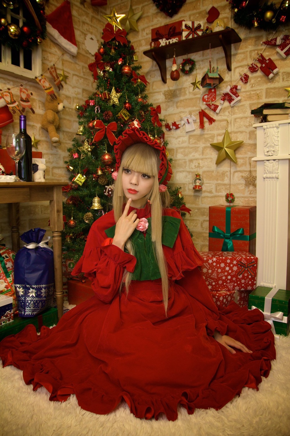 1girl blonde_hair box candle christmas christmas_ornaments christmas_tree dress gift gun red_dress shinku solo star_(symbol)