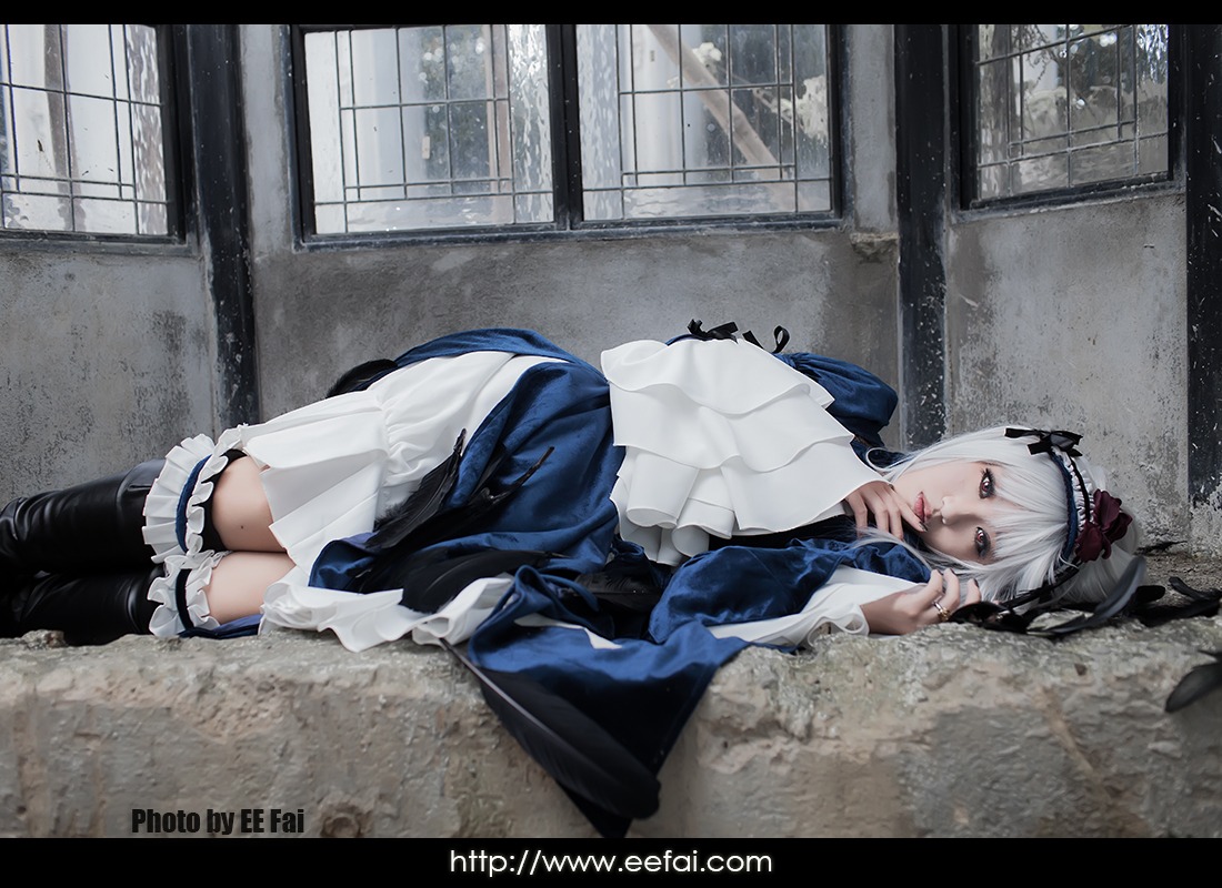 1girl black_border dress frills hairband indoors letterboxed lying on_side short_hair solo suigintou window