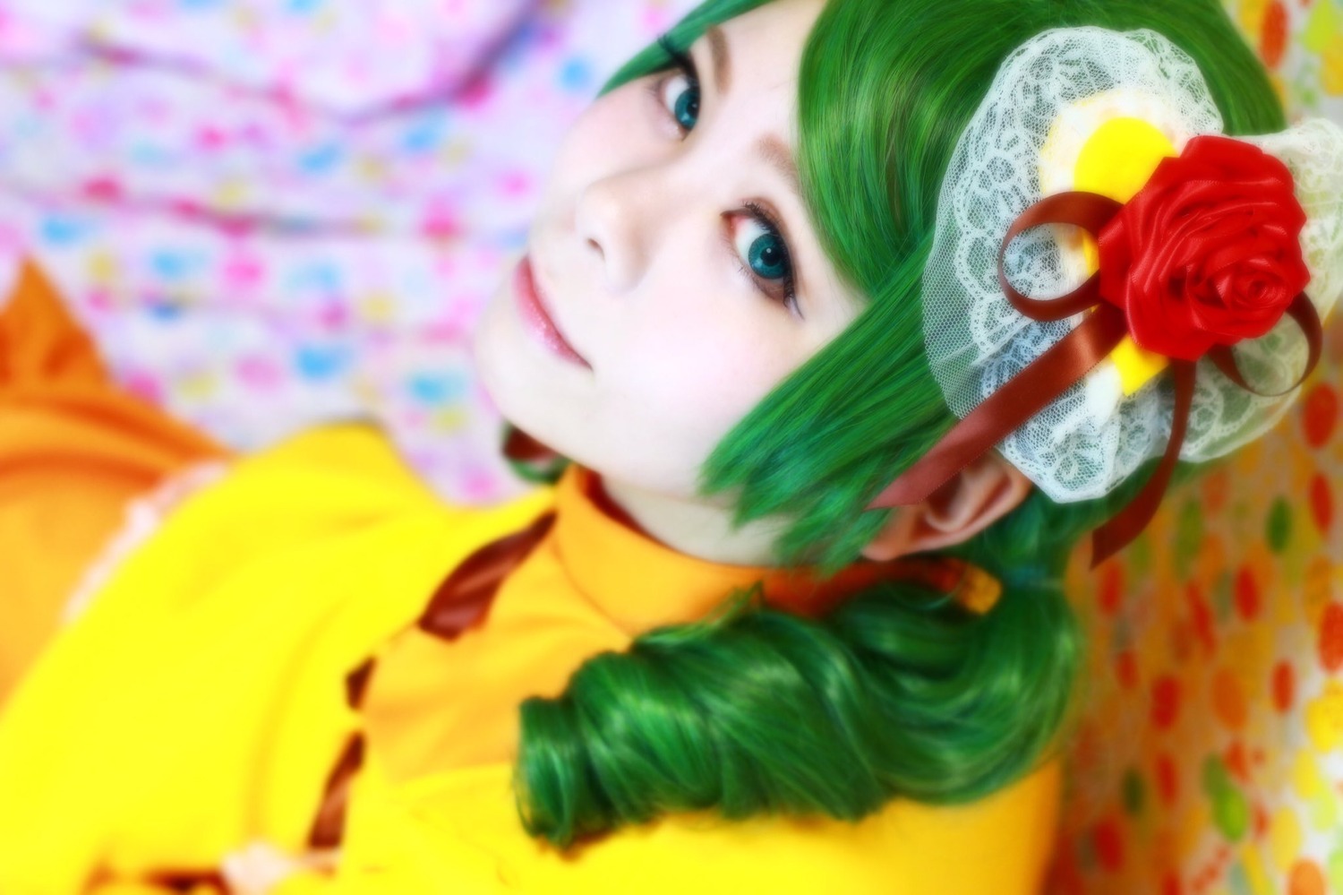 1girl blue_eyes blurry blurry_foreground bouquet depth_of_field flower green_hair hat kanaria photo red_flower red_rose rose solo