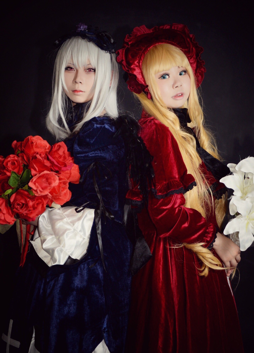 2girls blonde_hair blue_eyes bouquet dress flower hat lips long_hair looking_at_viewer multiple_cosplay multiple_girls realistic red_eyes rose shinku tagme