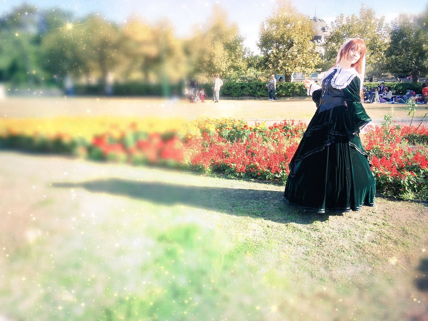 1girl blurry blurry_foreground brown_hair day depth_of_field dress flower long_hair long_skirt looking_at_viewer outdoors solo standing suiseiseki