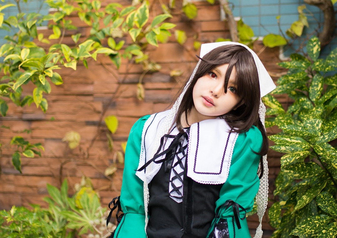 1girl brick_wall brown_hair dress head_scarf heterochromia ivy leaf lips long_hair long_sleeves looking_at_viewer outdoors plant potted_plant red_eyes ribbon solo suiseiseki upper_body vines