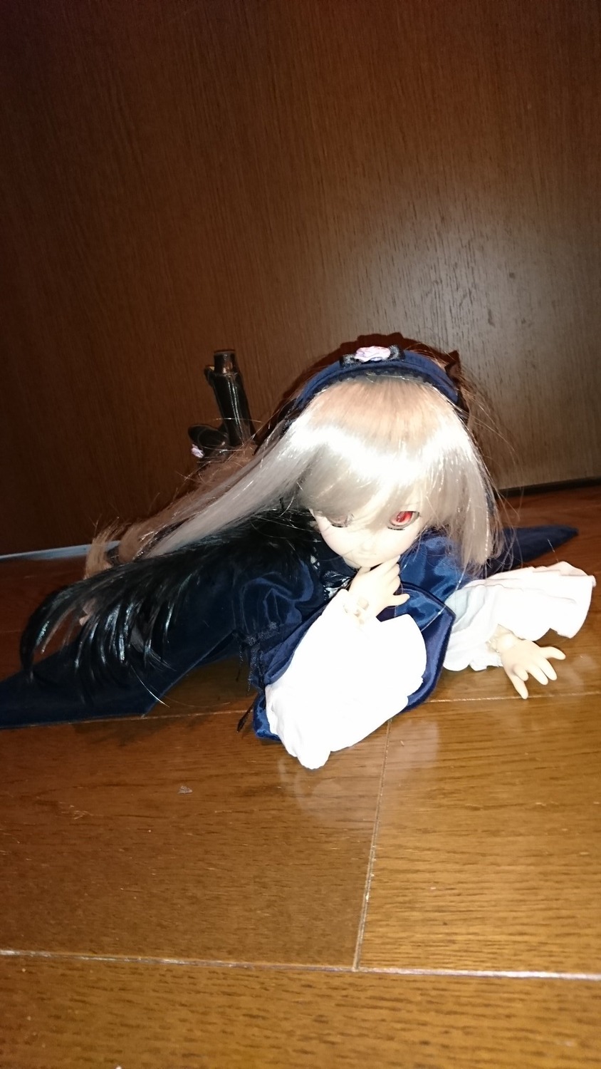 1girl doll dress gun long_hair long_sleeves red_eyes solo suigintou weapon