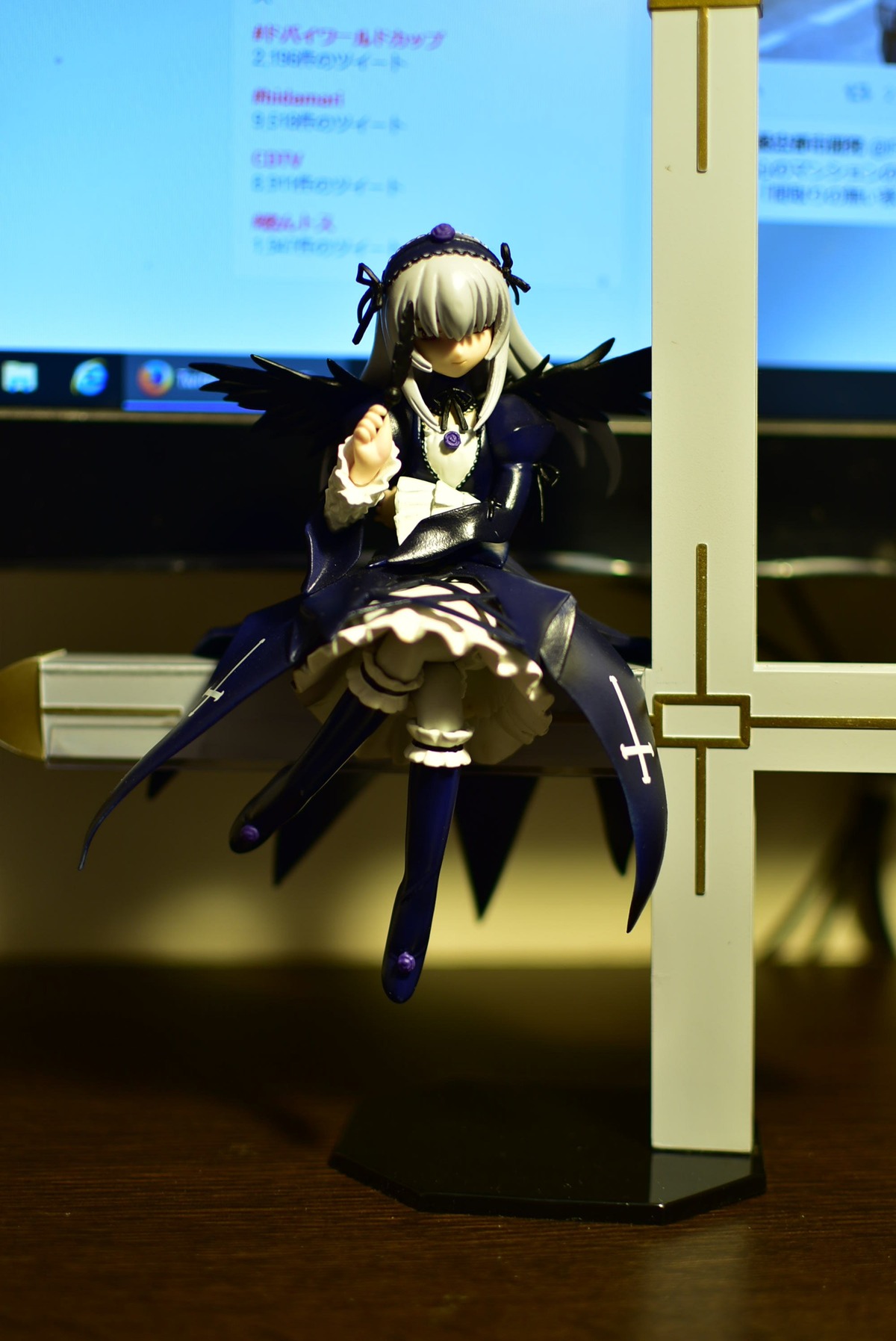 1girl 3d doll dress frills hairband long_hair long_sleeves ribbon silver_hair solo suigintou thighhighs wings