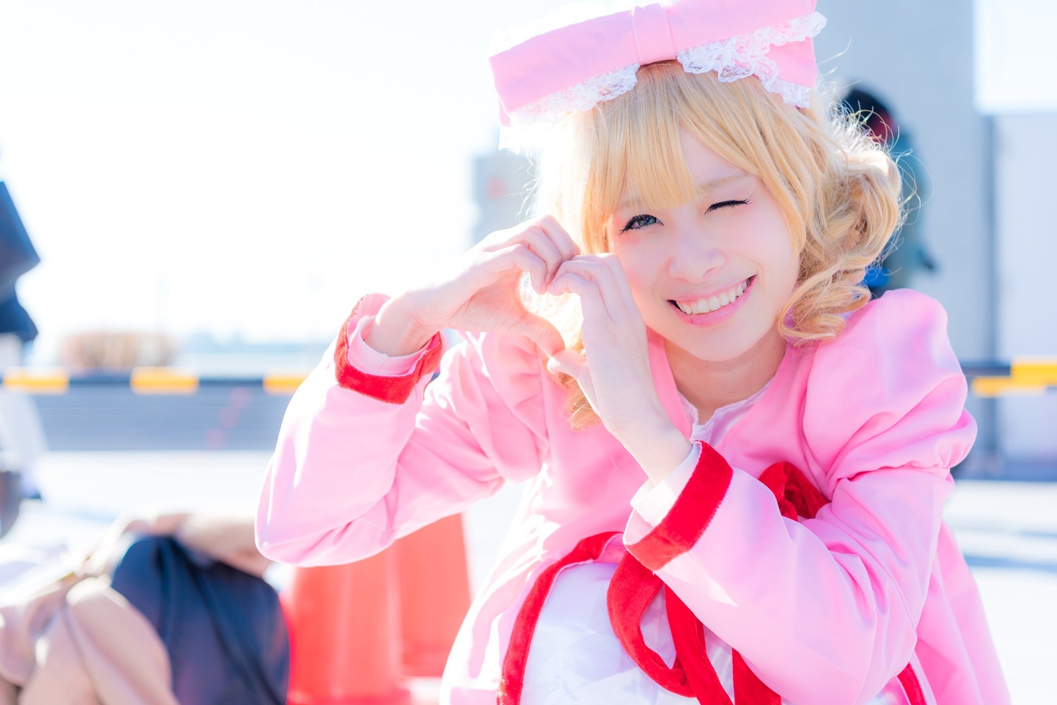 1boy blonde_hair blue_eyes blurry blurry_background depth_of_field hinaichigo one_eye_closed photo smile solo teeth