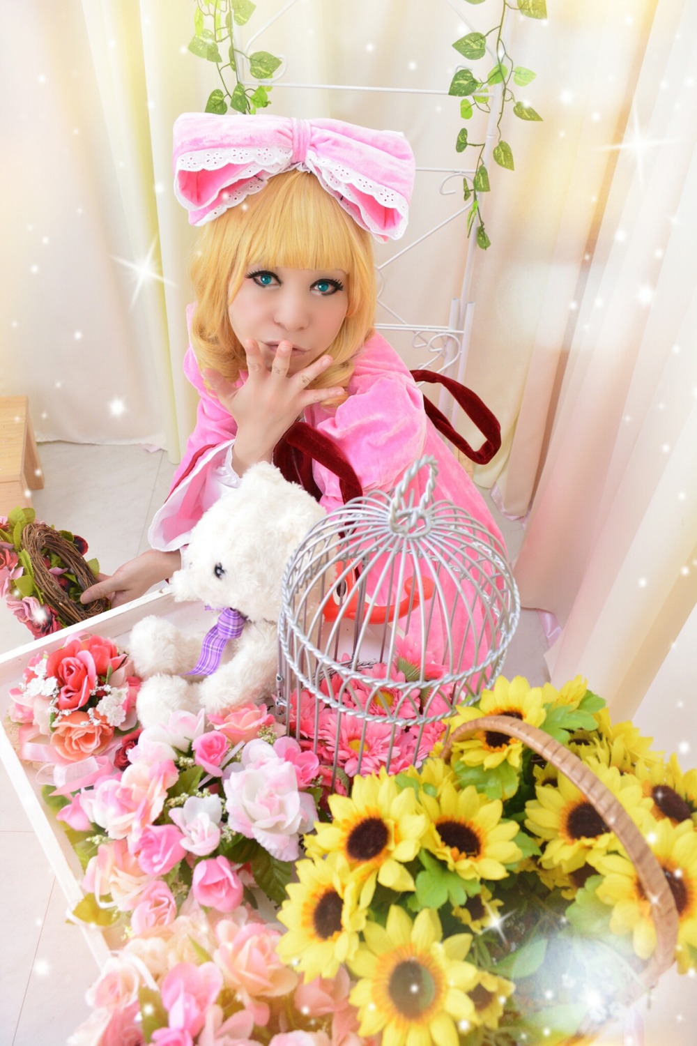 1girl basket blonde_hair blue_eyes bow dress flower hinaichigo pink_dress plant potted_plant rose sitting solo sparkle sunflower vase