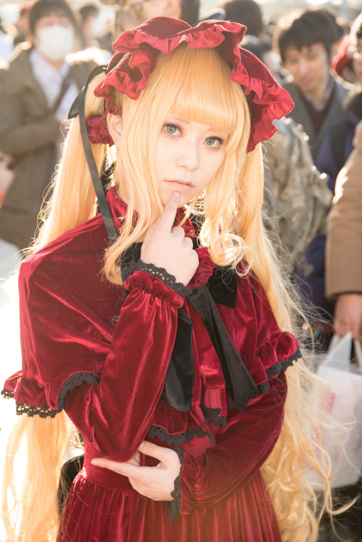 1girl bangs blonde_hair blurry blurry_background blurry_foreground depth_of_field dress frills lace lips lolita_fashion long_hair long_sleeves looking_at_viewer shinku solo solo_focus