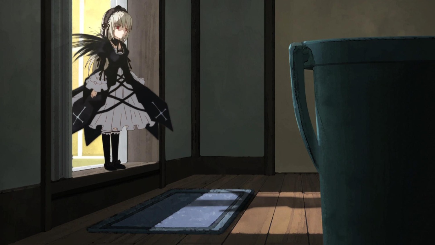 1girl bangs black_dress closed_mouth dress frills gothic_lolita hairband image indoors long_hair long_sleeves red_eyes solo standing suigintou