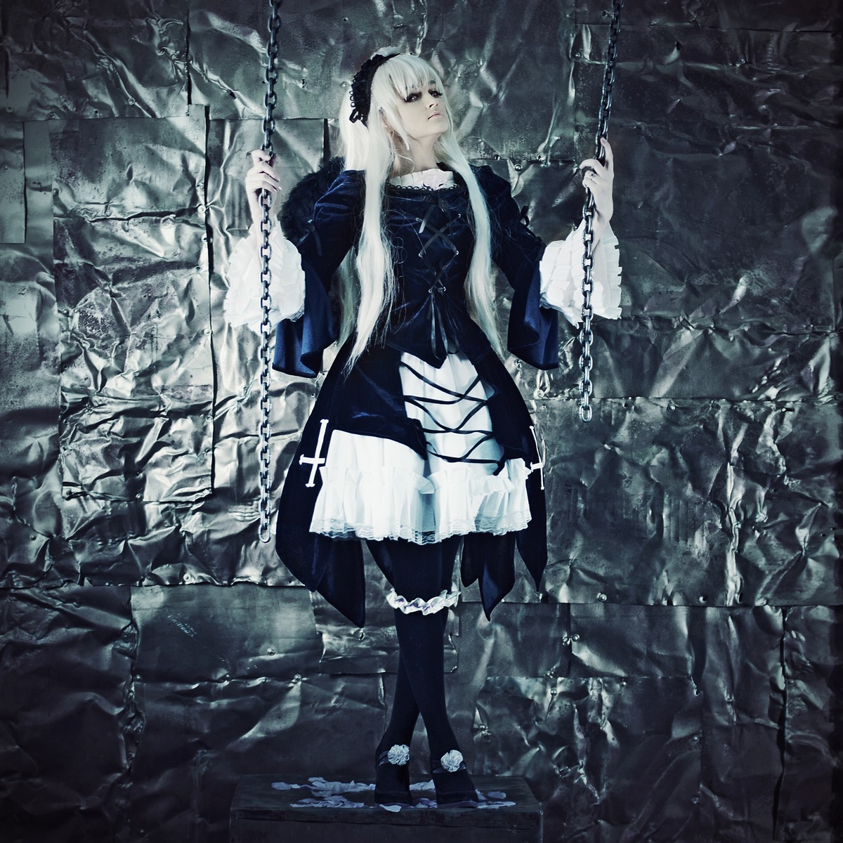 1girl broken broken_chain chain chained cuffs dress gothic_lolita handcuffs lolita_fashion long_hair shackles solo standing suigintou weapon white_hair