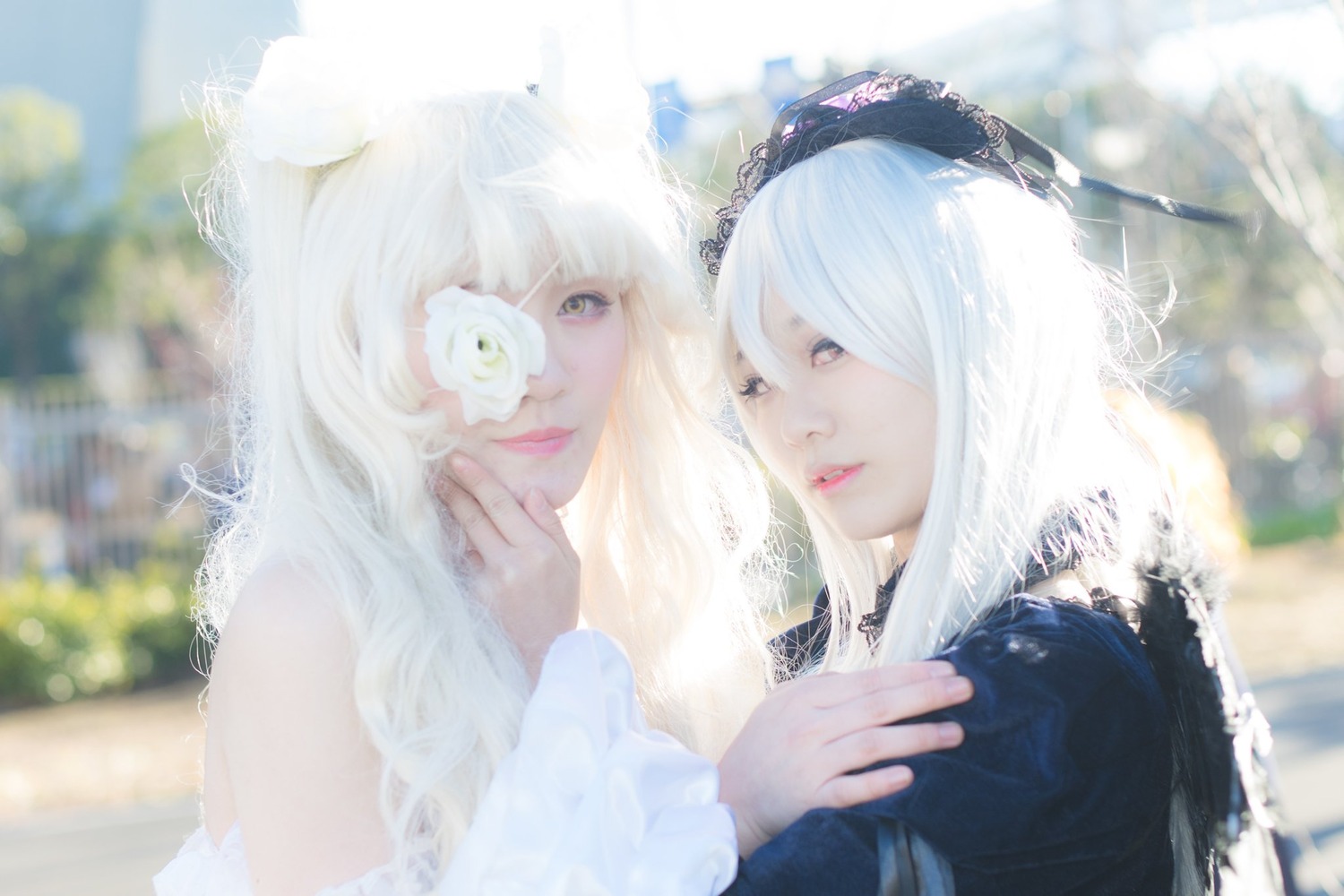 2girls bangs blurry blurry_background building day depth_of_field lips long_hair looking_at_viewer multiple_cosplay multiple_girls outdoors tagme white_hair