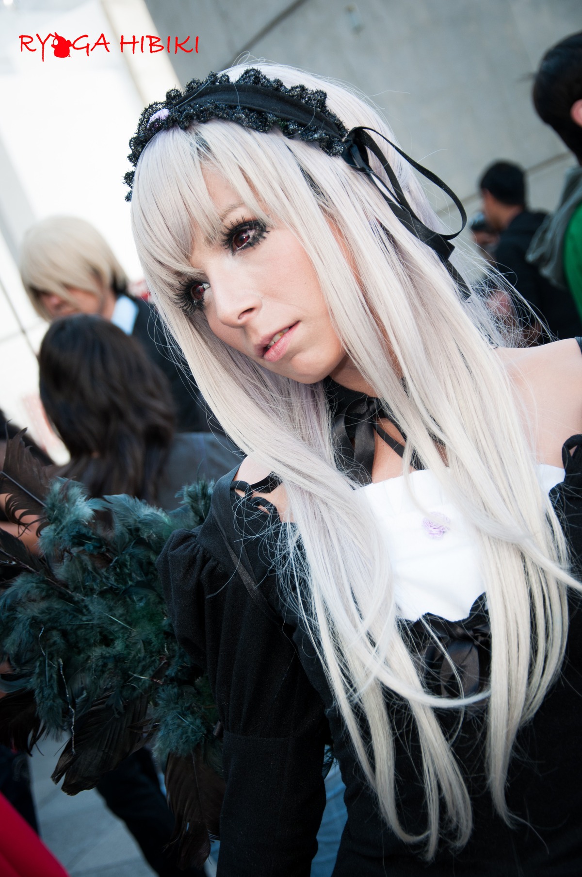 1girl bangs blurry blurry_background blurry_foreground depth_of_field gothic_lolita hairband lace lips lolita_fashion long_hair looking_at_viewer multiple_boys ribbon solo solo_focus suigintou white_hair