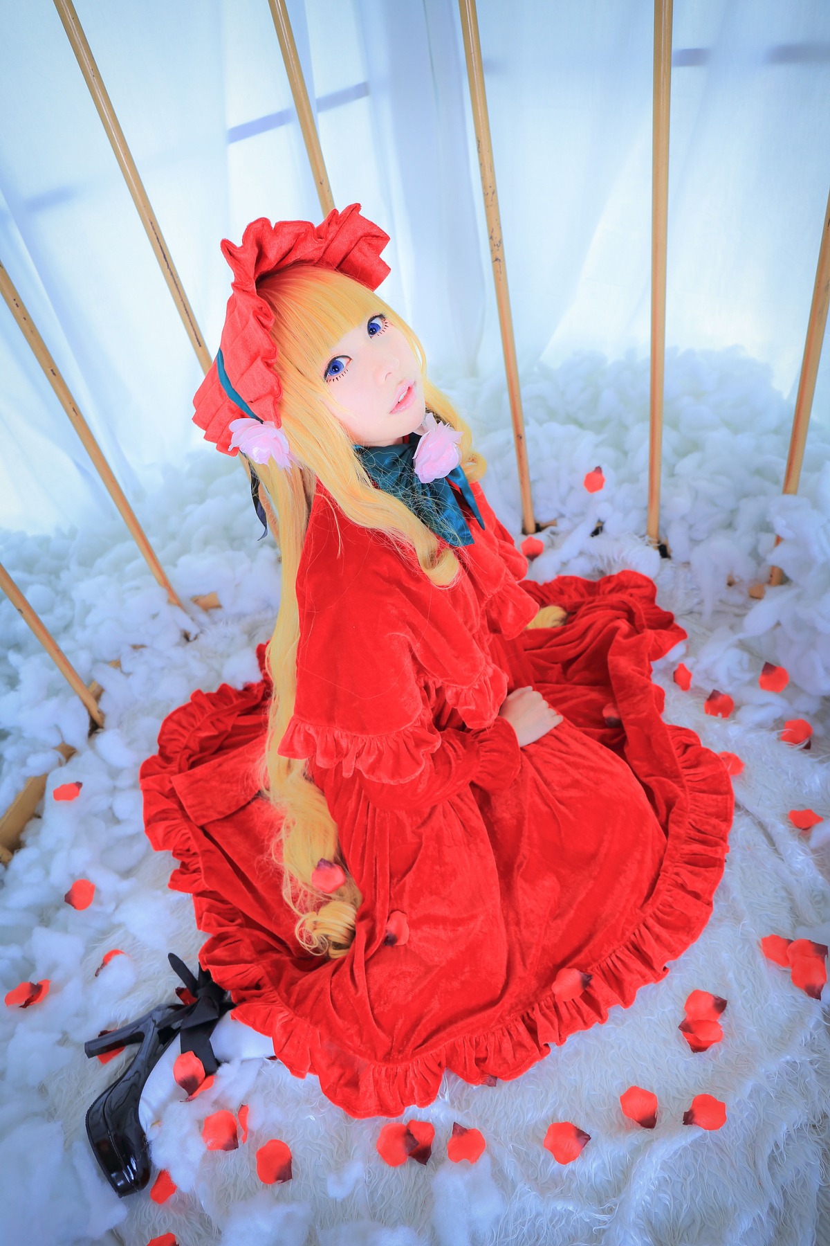 1girl blonde_hair blue_eyes bonnet dress flower long_hair petals red_dress rose rose_petals shinku sitting solo water