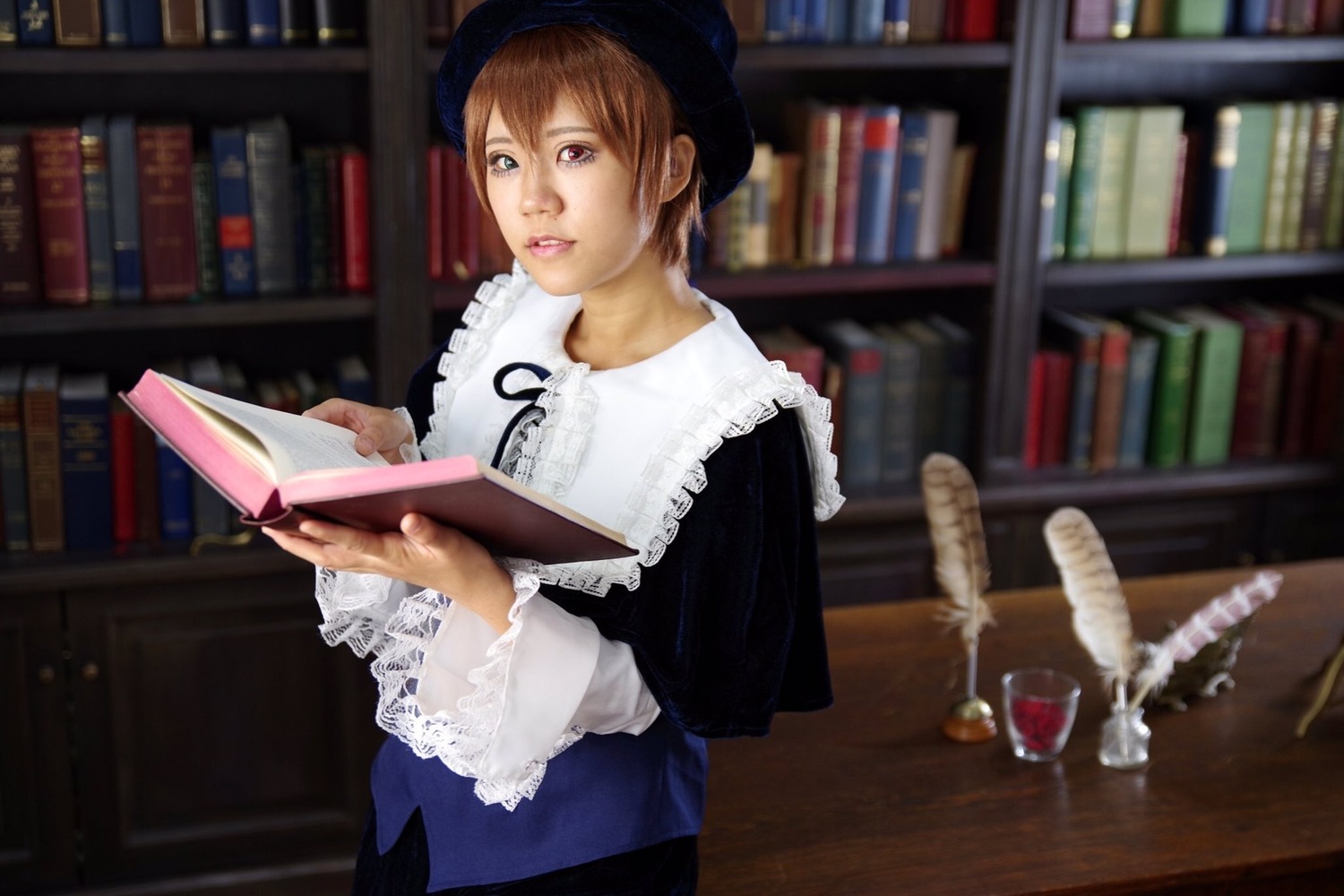 1girl blurry book book_stack bookshelf brown_hair depth_of_field hat holding_book indoors library lips open_book realistic short_hair solo souseiseki